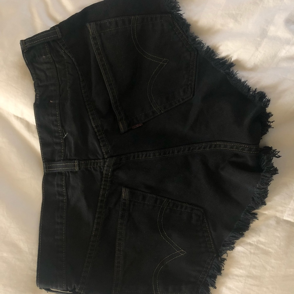 Distressed Levi’s denim shorts